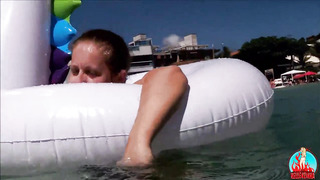 my hubby, my unicorn and me in glamour have fun on a public beach.