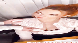 Spectacular honey with crimson hair, Amour is toying with her massive bumpers in front of the camera