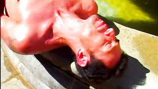 Muscle boys fucking next to a fountain