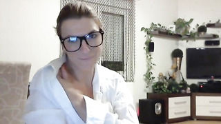 Nerdy MILF sucks and fucks a dildo